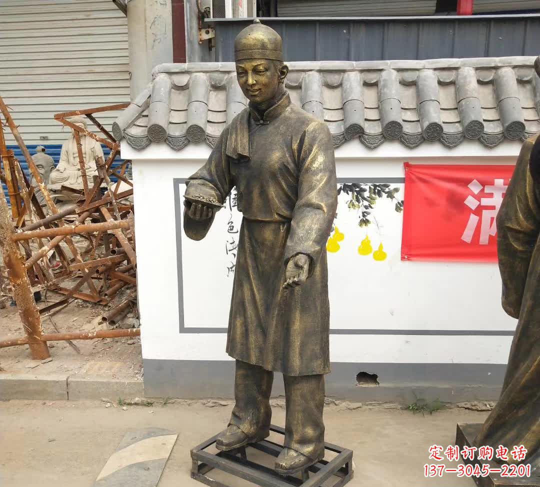 益阳传承百年店小二铜雕