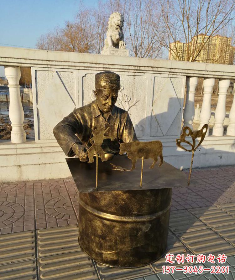 益阳公园画糖人的人物铜雕
