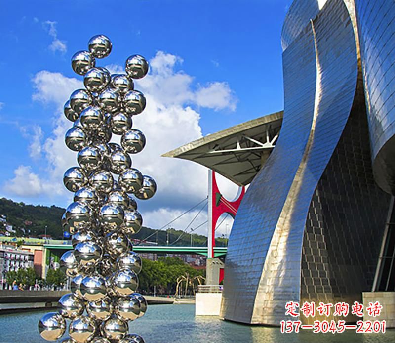 益阳高端不锈钢抽象龙柱雕塑