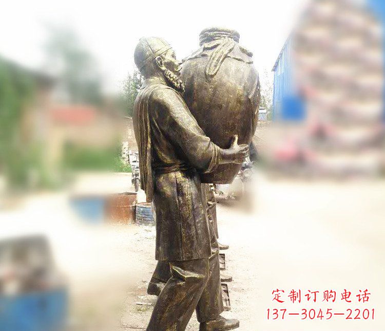 益阳铜雕店小二抱酒人物雕塑