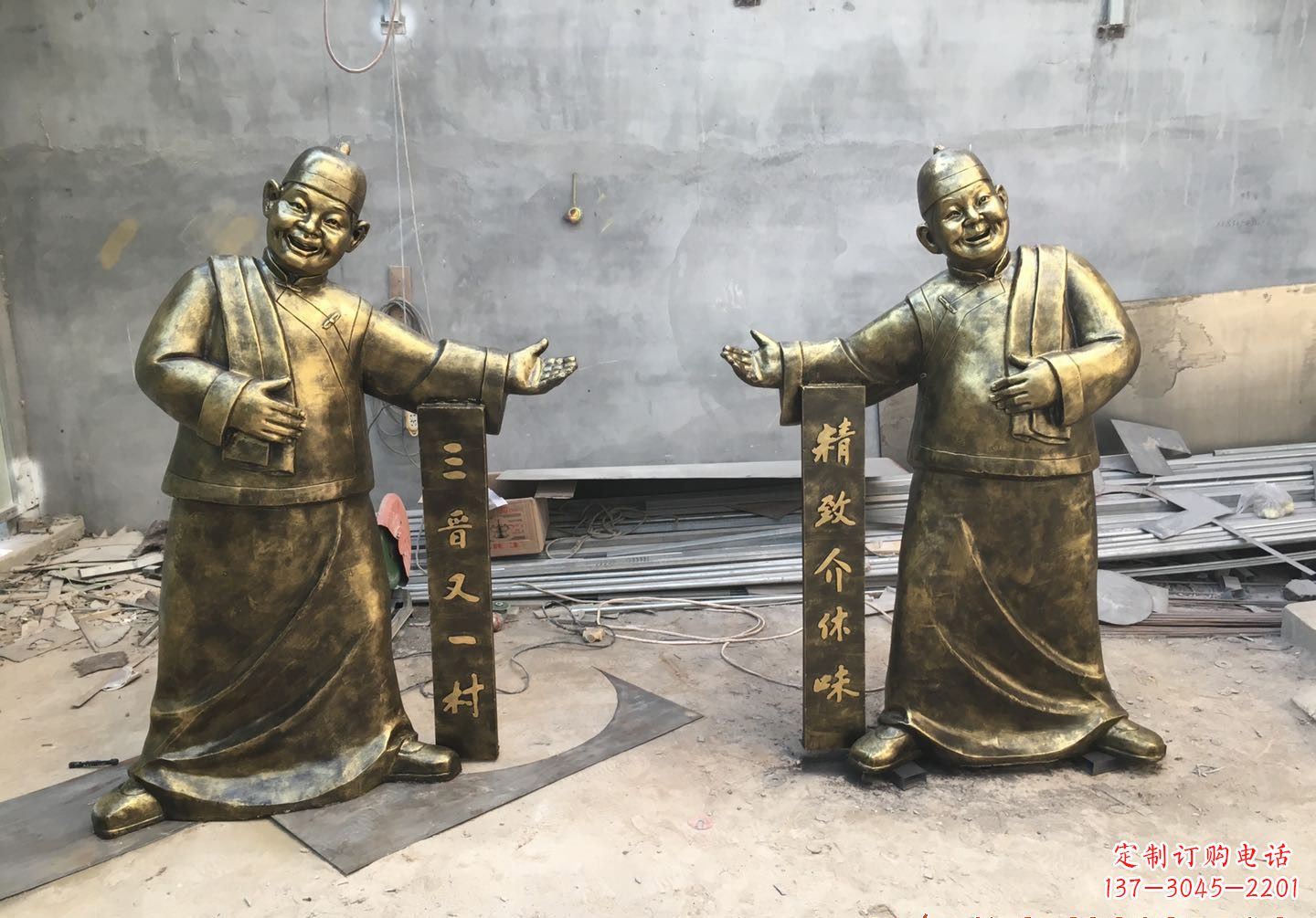 益阳中领雕塑:酒店门口店小二人物铜雕