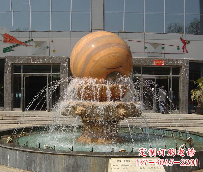 益阳石来运转球晚霞红风水球石雕