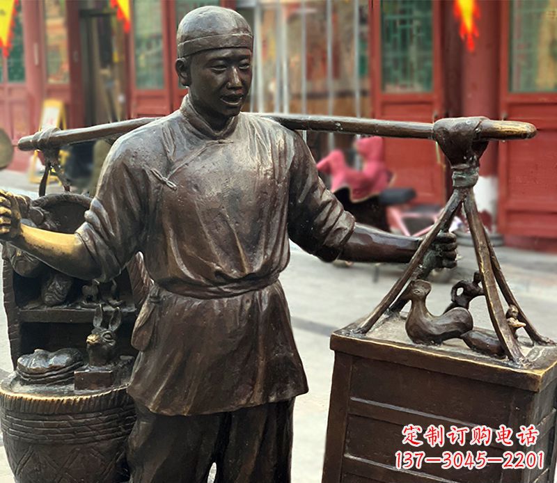 益阳铜雕步行街卖货郎人物雕塑