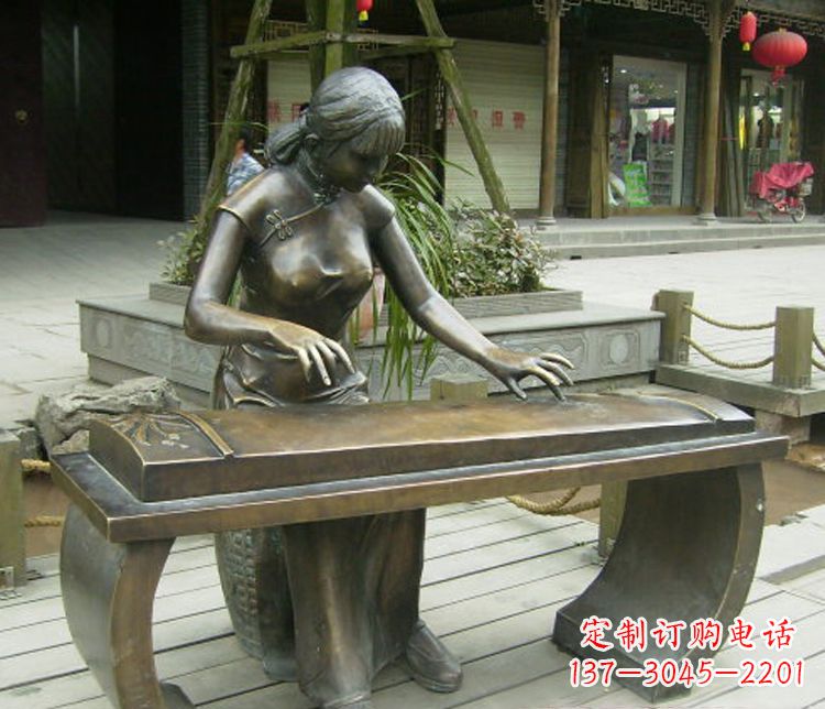 益阳铜雕现代人物弹古筝雕塑