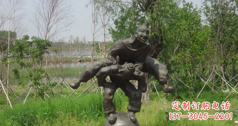 益阳园林站在球上面跳山羊的人物景观铜雕