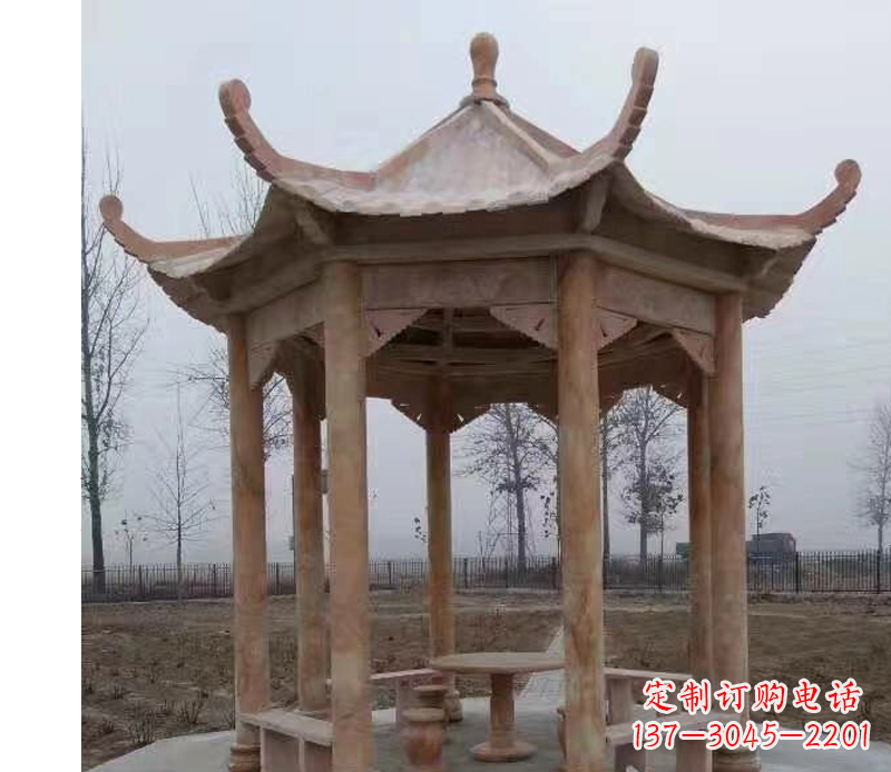 益阳公园晚霞红八角石雕凉亭