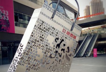 益阳购物袋雕塑-步行街室外锻造刻字不锈钢购物袋雕塑